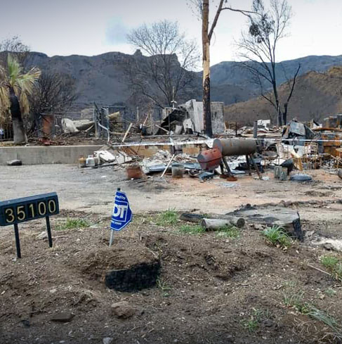 remains of house destroyed by wildfire